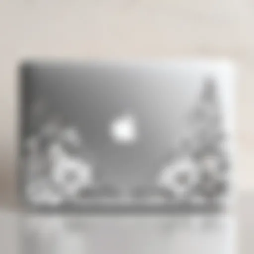 Elegant floral design decal on a MacBook
