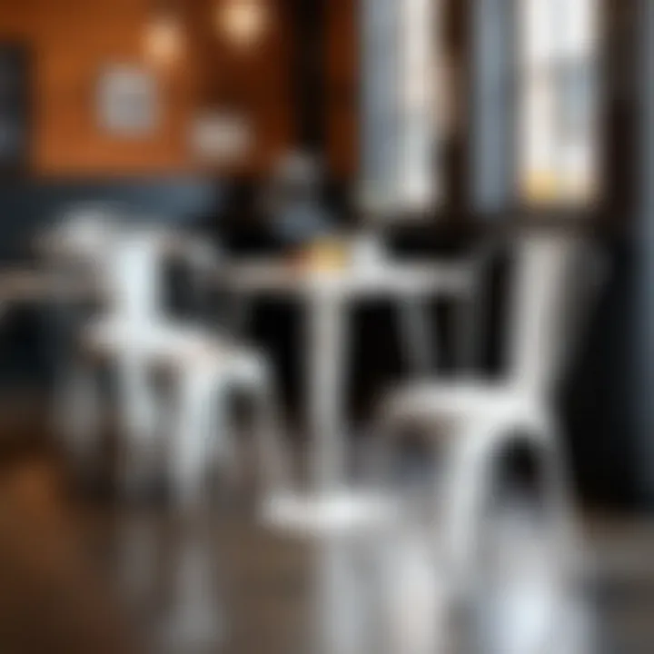 Distressed white metal chairs arranged in a trendy café space