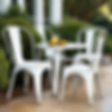 Elegant Outdoor Arrangement with Distressed White Metal Chairs Stylish outdoor setting with distressed white metal chairs