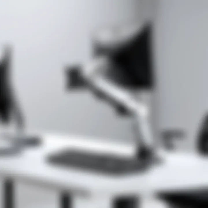 Close-up view of Ergotron monitor arm features and adjustments