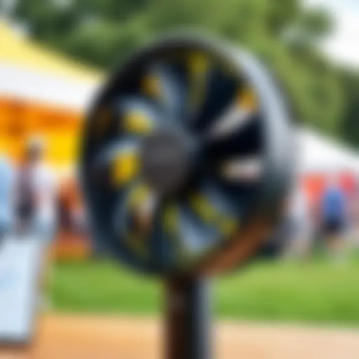 A stylish battery neck fan in use during an outdoor event, illustrating its functionality.