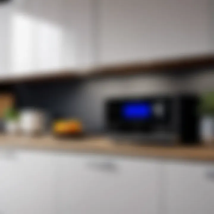 A stylish kitchen setup featuring an under the cabinet radio CD player in use.