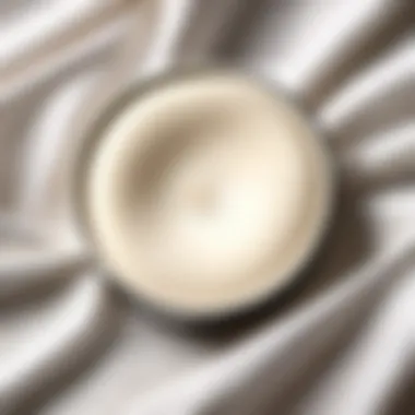 A close-up view of white linen body powder in a delicate setting