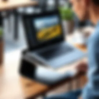 Using a Portable Stand for On-the-Go Productivity A person using a laptop on a portable stand in a cafe setting