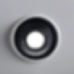 Close-up of a recessed light installation using a hole saw